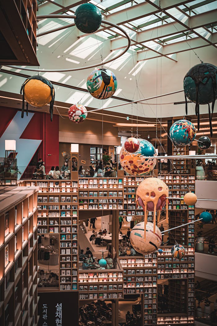 Vibrant art installation in a bustling Seoul library, showcasing books and contemporary decor.